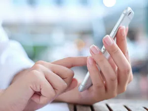 hands holding smartphone
